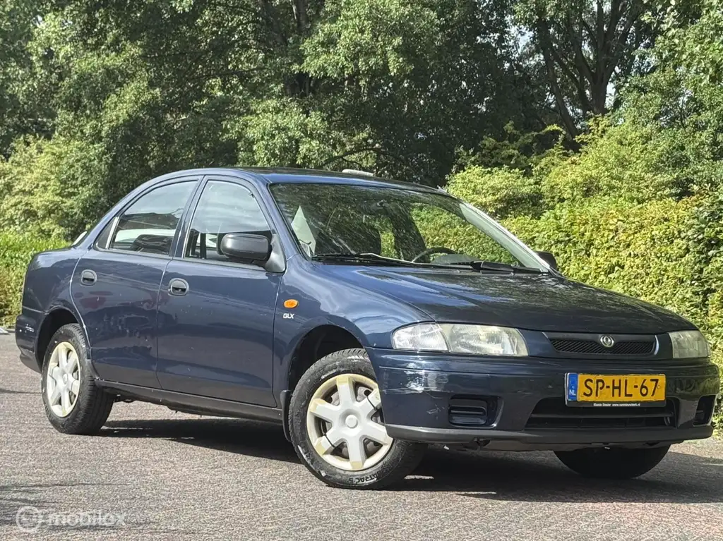 Mazda 323 1998 из Европы — купить под ключ