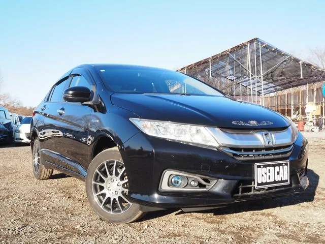 Honda GRACE 2015 из Японии — купить под ключ