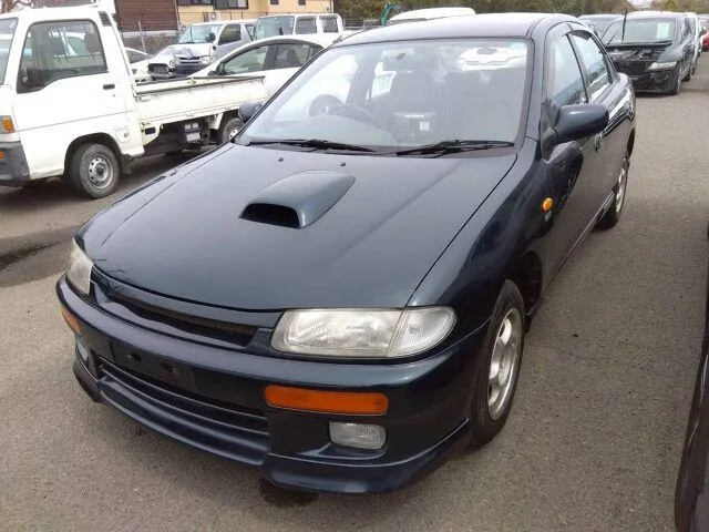 Mazda FAMILIA 1995 из Японии — купить под ключ