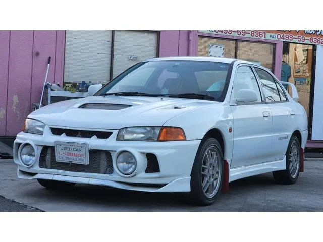 Mitsubishi LANCER 1996 из Японии — купить под ключ