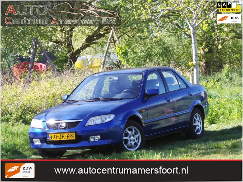 Mazda 323 2002 из Европы — купить под ключ